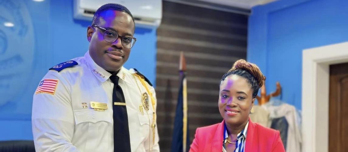 The Liberia Anti-Corruption Commission (LACC) Executive Chairperson, Cllr. Alexandra Kormah Zoe, shakes hands with Honorable Gregory Coleman, the Inspector General of the Liberian National Police.